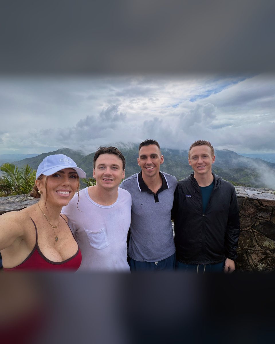 Andrew Rusk with his three siblings at a mountain overlook in El Yunque, Puerto Rico